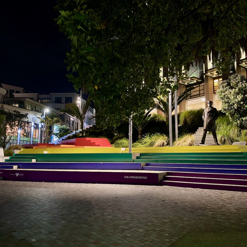 Rainbow coloured steps at night