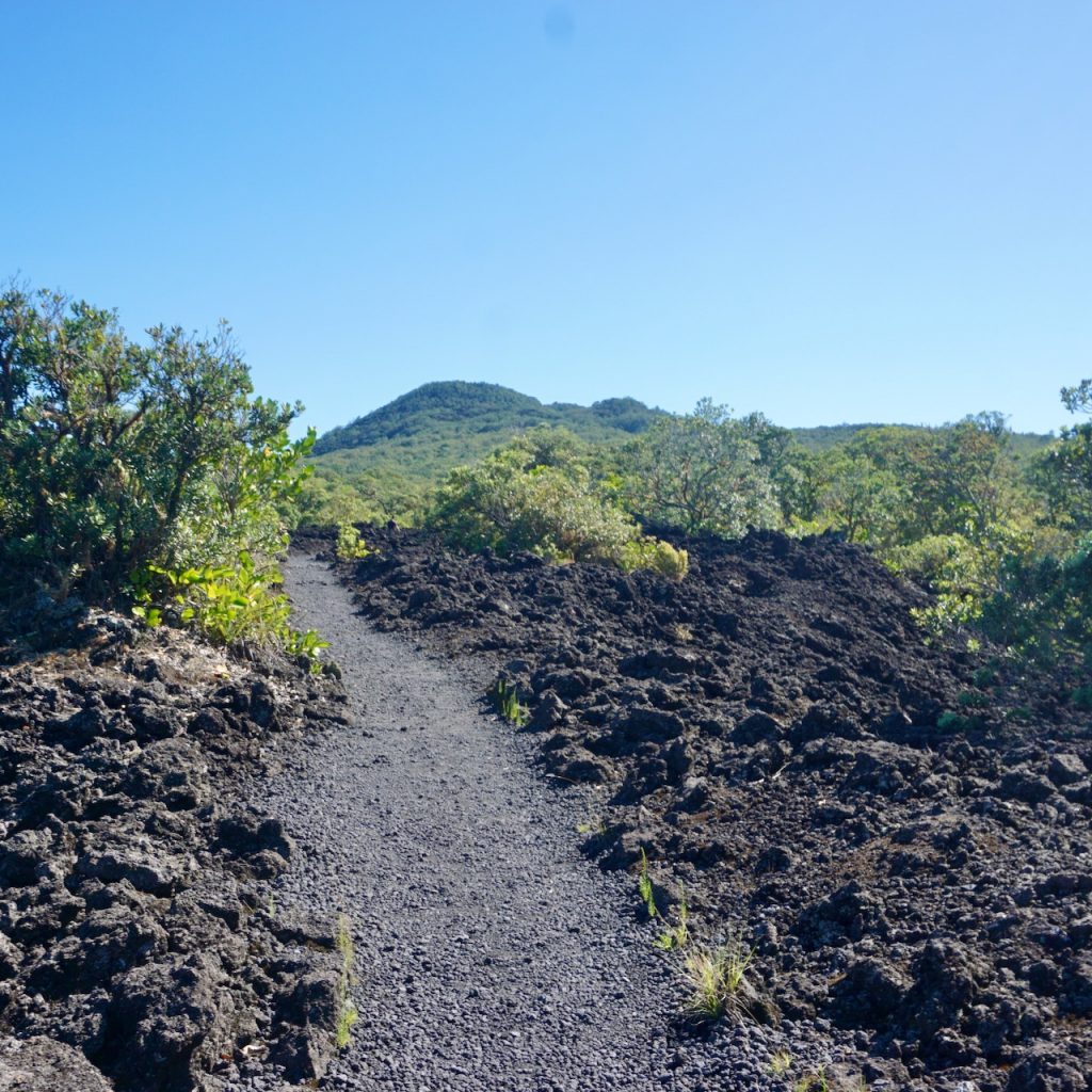 Path through scoria with hill behind